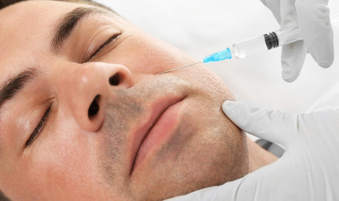 A man in Dallas receives dermal fillers.